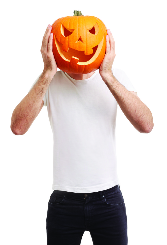 Halloween pumpkin on man head, joking, clipping path included