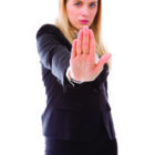 Businesswoman showing stop gesture