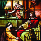 Stained glass window of Jesus, Martha and Mary